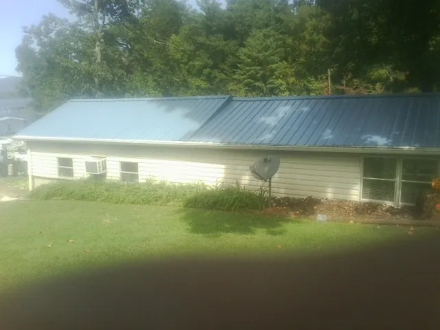 Blue metal roof running the length of a single story home in Mt Baldy
